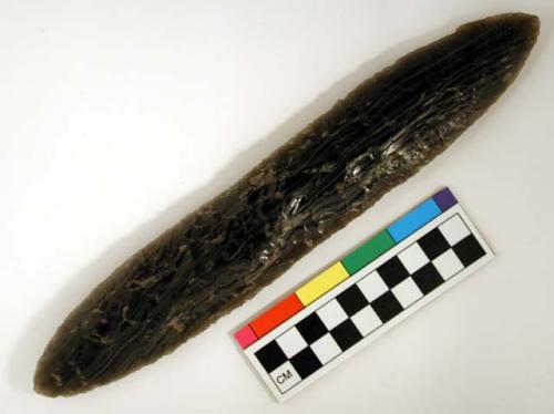 Chipped implement; chipped from black obsidian