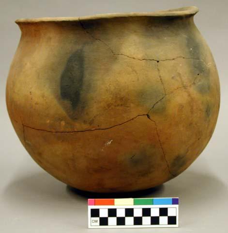 Ceramic vessel, slightly flared rim, reconstructed.