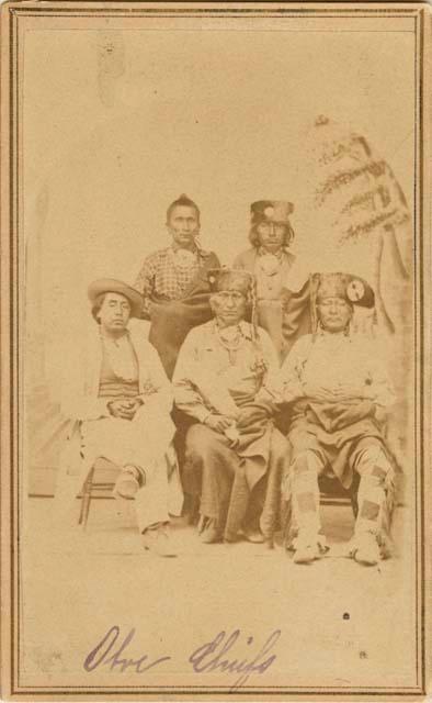 Studio portrait of five seated chiefs