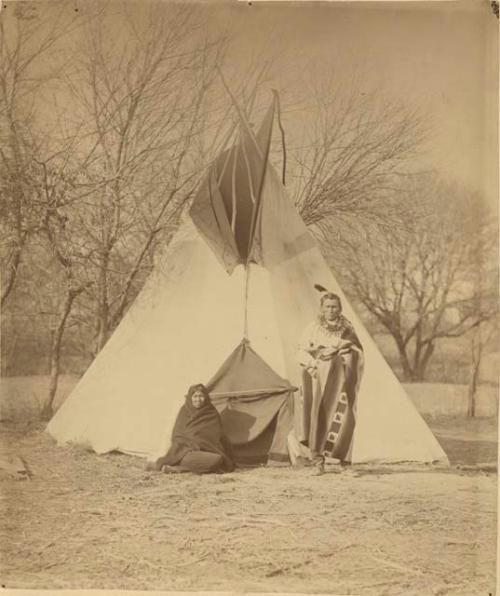 Photograph commissioned by Alice C. Fletcher, husband and wife before tent