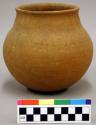 Ceramic vessel, complete, short slightly flared neck, plain.