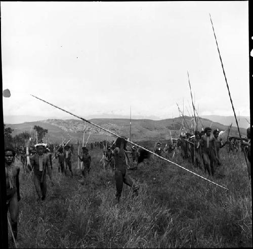 Warriors gathered, holding their weapons