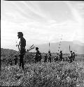 Men watching action on the Warabara