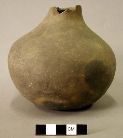 Ceramic complete vessel, broken at neck, plain