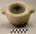 Ground stone mortar, 2 handles, mended