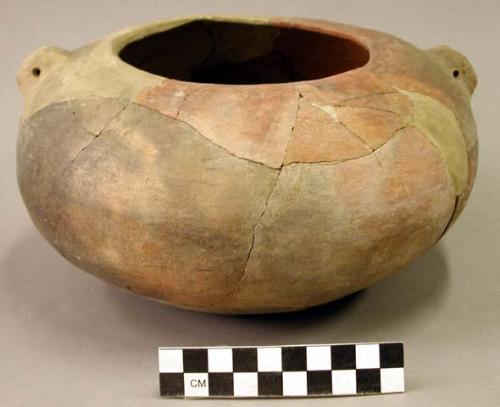 Red-on-buff seed bowl with 2 perforated lugs