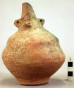 Pottery jar, handle on side, red clay, human face