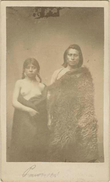 E-rah-cot-ta-hot and a woman, photographed in studio wearing blankets