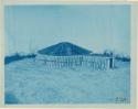 Model of an Earth Lodge, made by Miss Gay, with cotton wood slabs in place