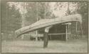 Menominee, carrying a Birch canoe