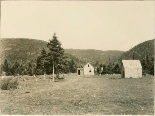 Several houses and surrounding land