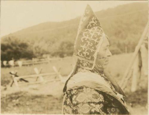 Mrs. Francis Gould in profile wearing hat