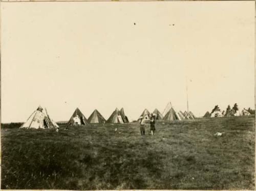 Bark and tarpaper wigwams; taken at the Micmac mission held on Corpus Christi Day