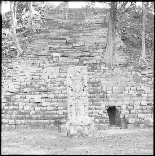 Stela and structure at Copan