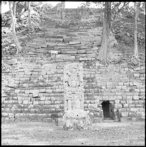 Stela and structure at Copan