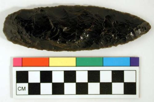 Chipped implement; chipped from black obsidian