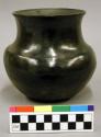 Shoulder pottery jar. Black ware, burnished on upper half.