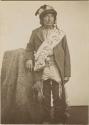 Studio portrait of Caddo man, Shuwi-ti-ti or "Little Boy," traditional caddi or chief in the late 19th century
