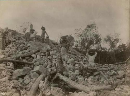 Mound 16, Mr. Thompson and men with finds