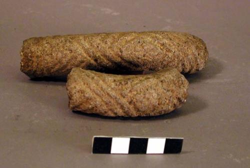 Ground stone fragments, incised design, poss. tail fragments of effigy metate