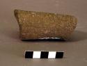 Ground stone fragment, cylindrical, poss. leg of metate, broken on both ends