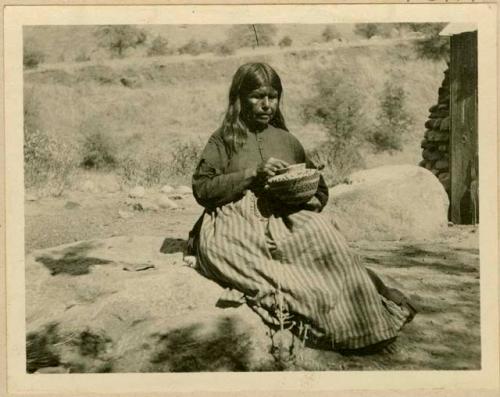 Woman, best living basket maker of tribe