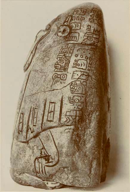 Anthropomorphic and zoomorphic carving of nephrite and jadeite with glyphs