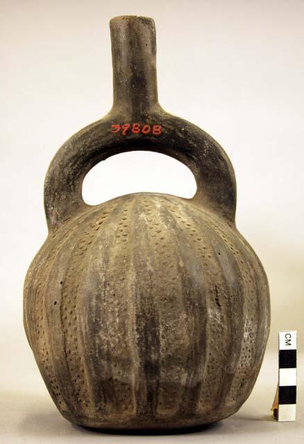 Pottery jar mouth in center of cross handle, stamped