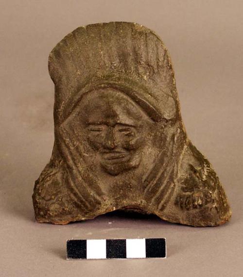 Cast of human effigy, top half only, incised