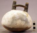 Ceramic bottle, double spout & bridge, rounded body, flattened base