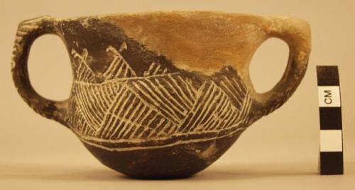 Clay two-handled mug - plaster cast