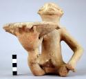 Crude pottery figure