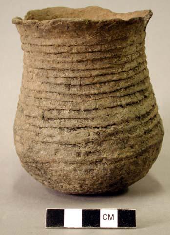 Ceramic vessel, corrugated body, flared rim, chipped rim.