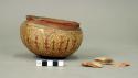 Red on cream pottery bowl