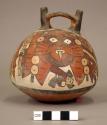Double spout bottle painted in polychrome w/ 2 "anthropomorphic mythical beings"