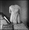 Sculpted torso with inscription from Tonina