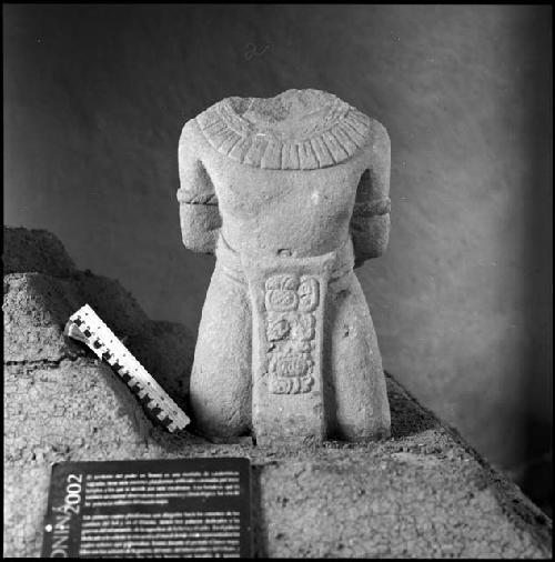 Sculpted torso with inscription from Tonina