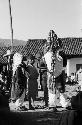 Man with headdress and children