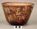 Bowl with polychrome painted design of a warrior holding a feather staff and weapons