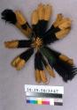 Feathered headdress, tan and black feathers with fibre attachment ("njuli")