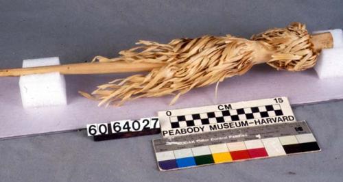 Prayer stick pointed at one end and with shavings