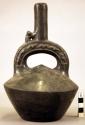 Stirrup vessel, black ware