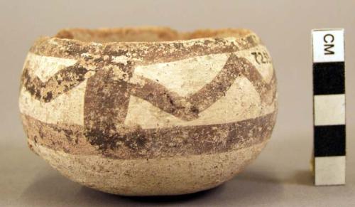 Earthen cup, ornamented