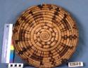 Coiled basket tray with design of animal figures