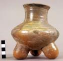 Ceramic tripod jar, rattle legs, incised linear design, mended, reconstructed