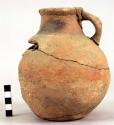 Painted earthen jar with handle