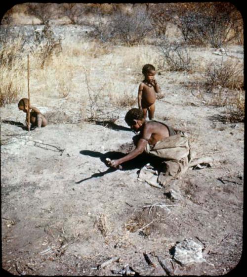 Slide from Marshall Expedition: "Hunting roots, womens work"