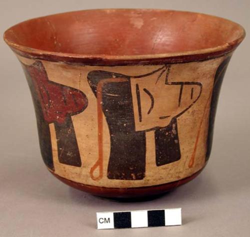 Ceramic bowl, flared rim, decapitated head motif on exterior, mended