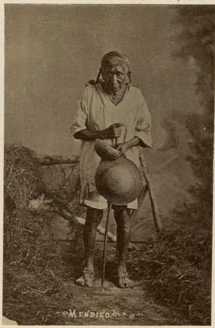 Studio portrait of Maya man, "beggar"