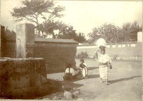 Maya women in courtyard